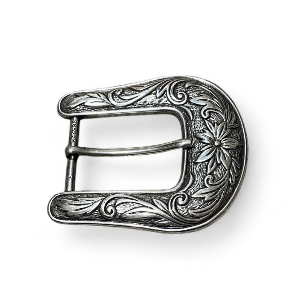 silver belt buckle with floral detailing